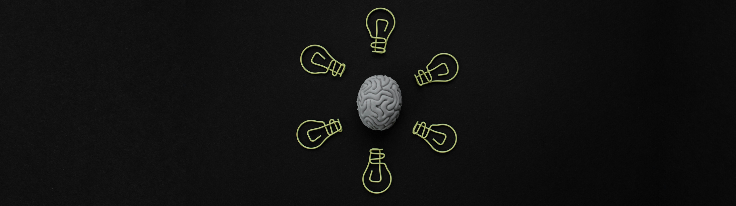 Image of a brain encircled by lightbulbs