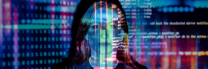 A woman's face overlaid with colorful digital code and binary patterns in blue, red, and green tones.